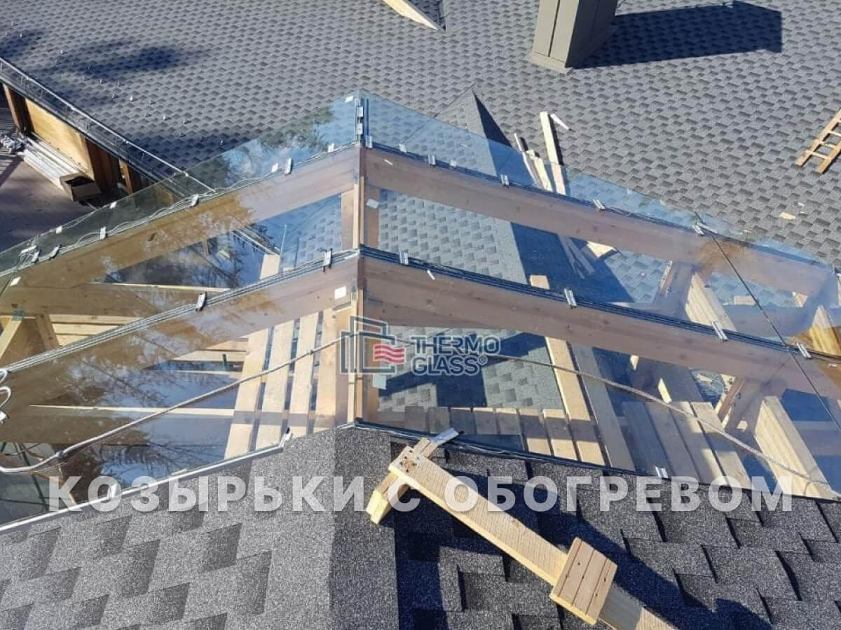 Стеклянные козырьки и навесы с обогревом стекла